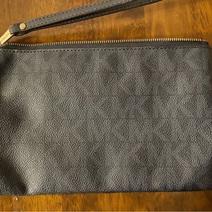 Michael Kors Navy Blue Wristlet-Worn once- Excellent clean/conditions ..